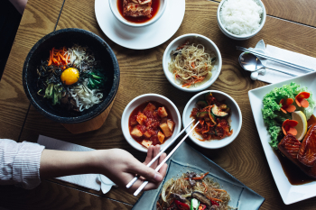 _2022-12-05_14_18_foodiesfeed.com_bibimbap-kimchi-and-other-traditional-korean-food.jpg