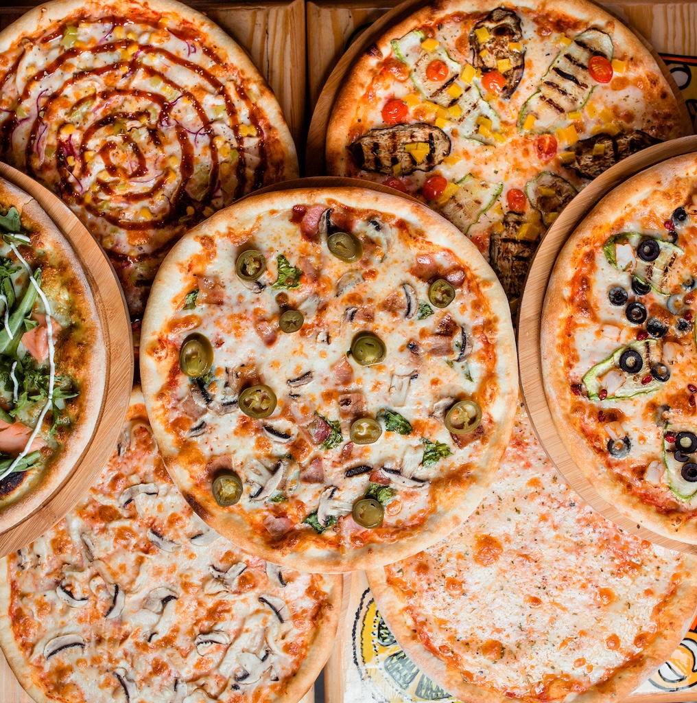 various-pizzas-table-top-view_1771003979.jpg